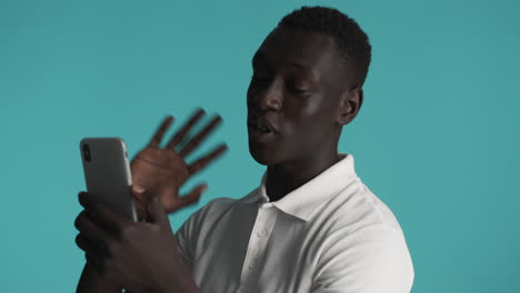 african american man on blue background.