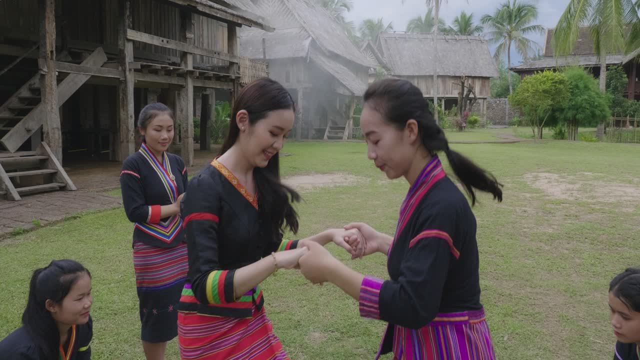 Ethnic Minority Women in Traditional Attire Performing a Dance