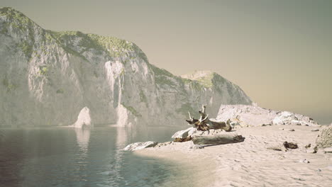 Stunning coastal landscape with serene waters and majestic cliffs at sunrise