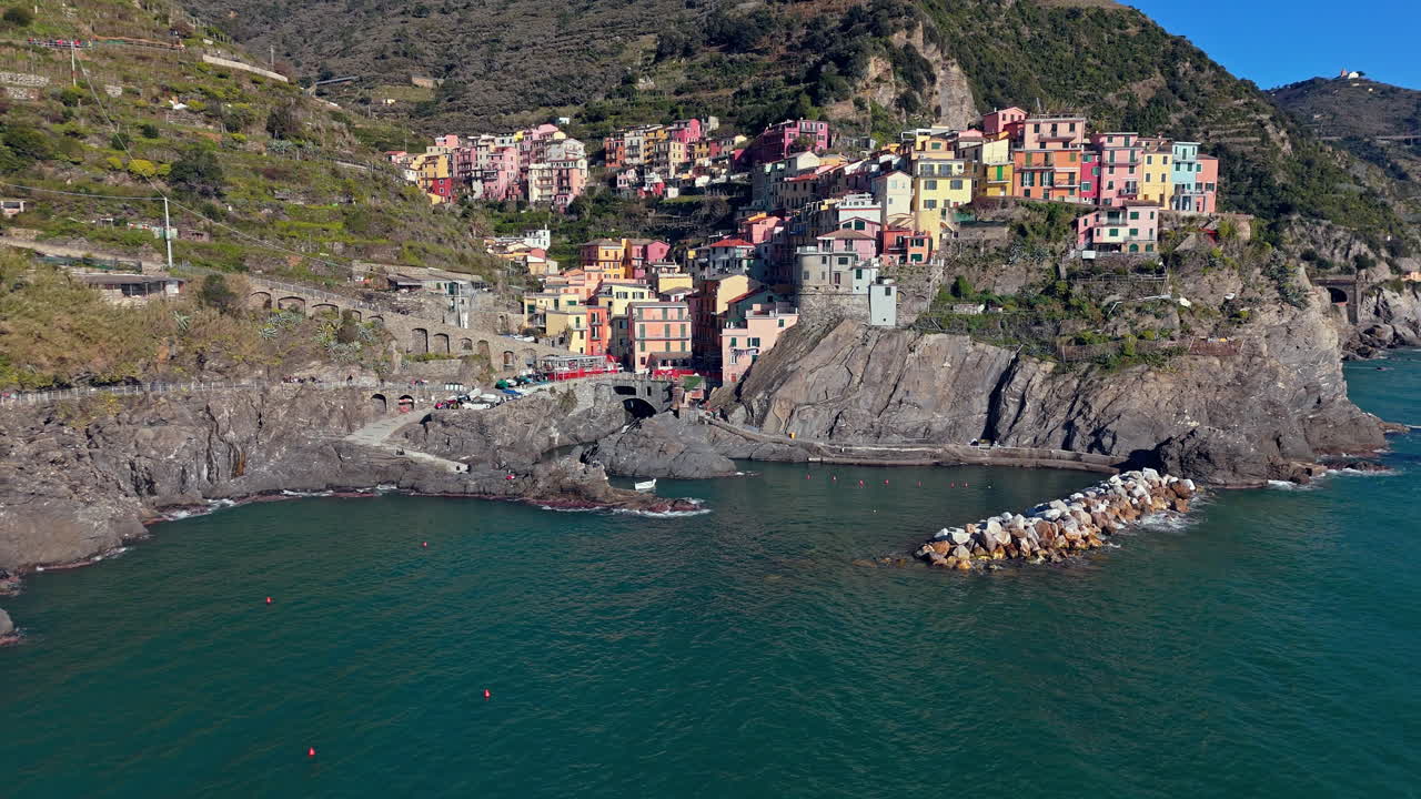 Picturesque coastal village of Manarola, Cinque Terre, Italy, aerial view of colorful houses