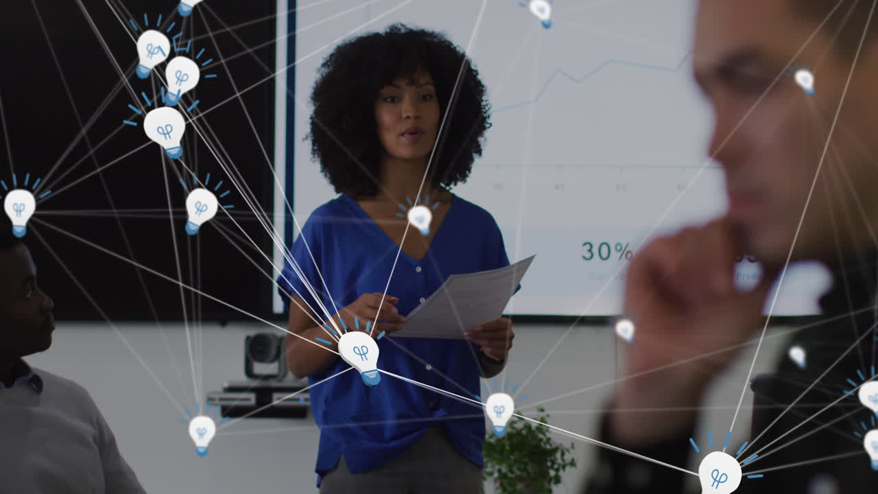 Animation of connections, statistics and data processing over diverse business people at meeting