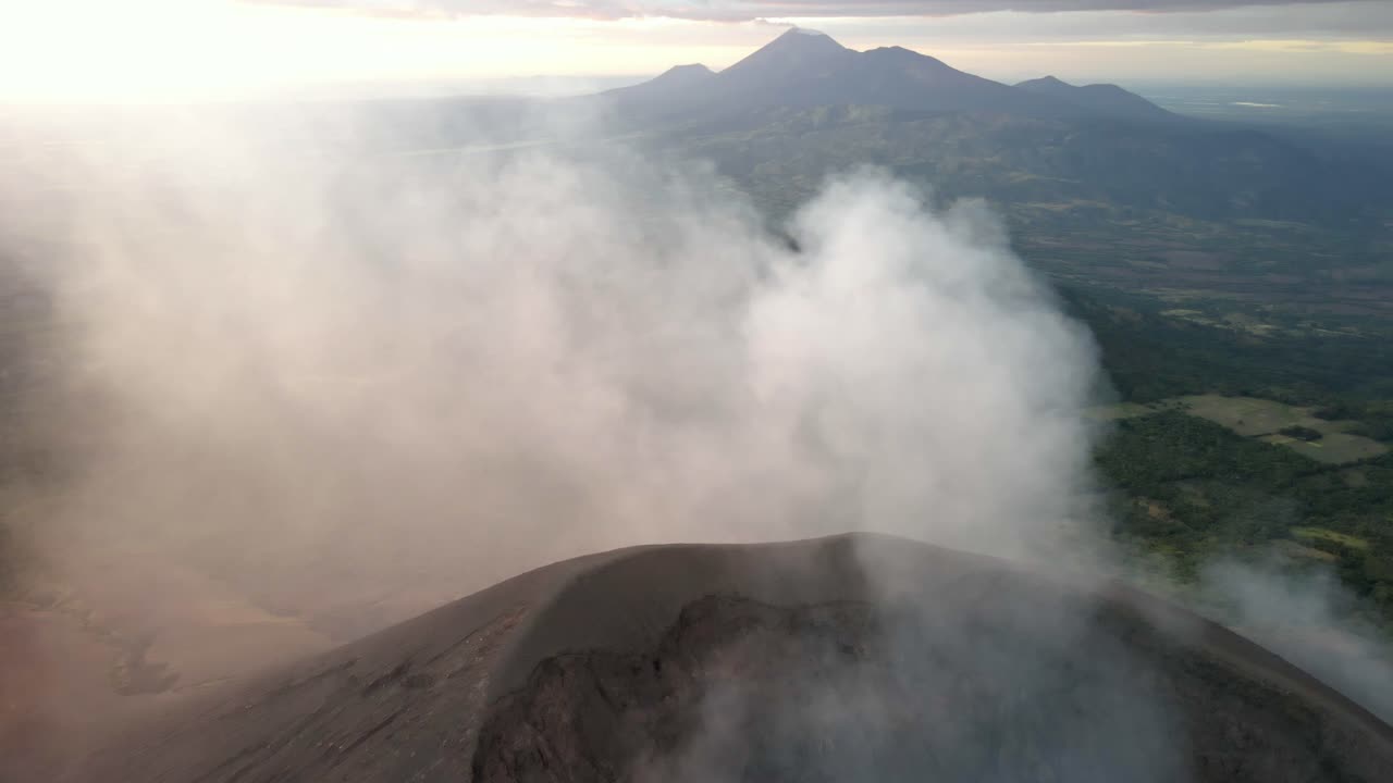 Nicaragua active volcano Telica stratovolcano steam coming out, aerial landscape