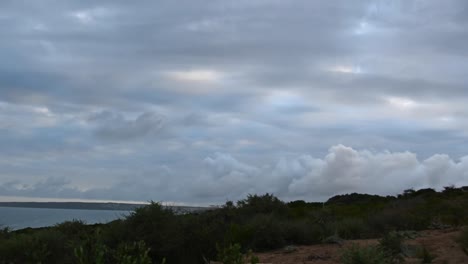 time lapse of clouds moving in different directions during a sunset in mosselbay in south africa.