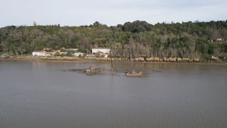 Rusty-WWII-Frisco-Shipwreck-on-Gironde-Riverbank,-Bordeaux,-France