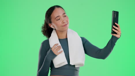 Woman taking selfie after workout