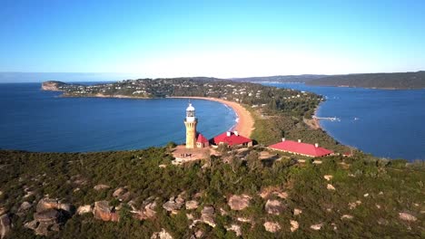 aerial shot of barrenjoey lighthouse at barrenjoey headland, palm beach, northern beaches of sydney australia