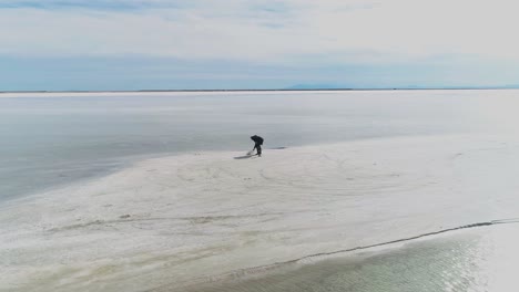 Beautiful-aerial-footage-of-a-man-on-a-Salt-Lake-in-Utah