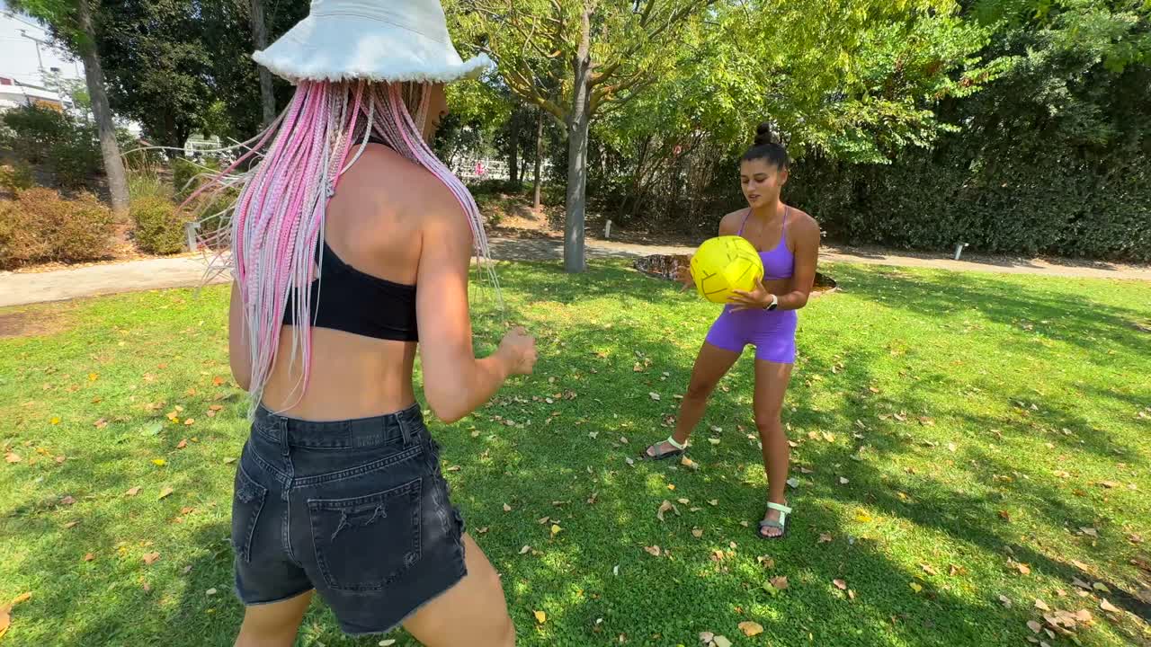 Women playing volleyball in the park