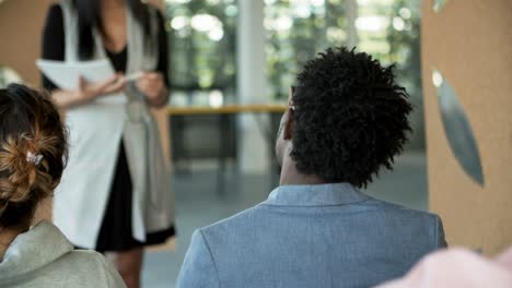 Beautiful-young-woman-working-with-audience