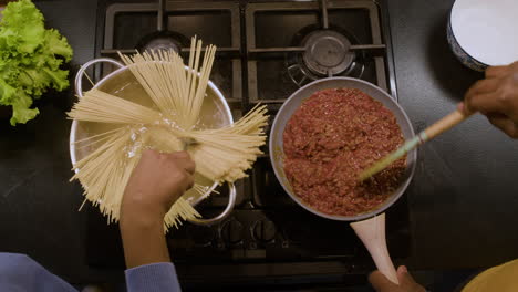 people cooking in the kitchen