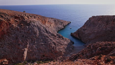 serenity of a hidden cove in crete with calm turquoise waters