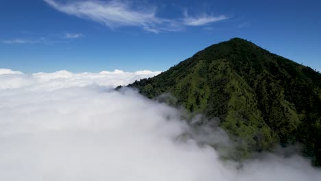 aerial view of mountains above the clouds in indonesia, gunung rante, ijen