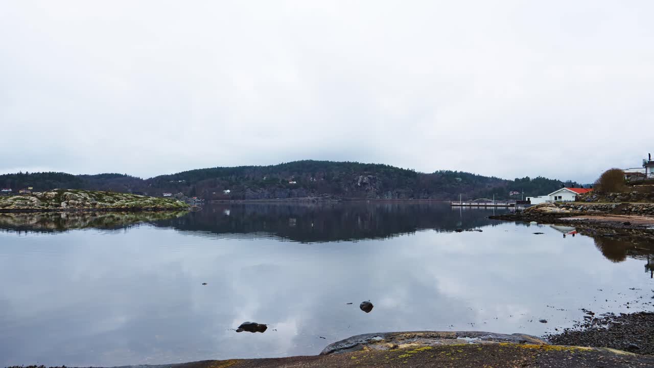 Calm fjord landscape with reflections near Havstensfjorden, Ljungskile, Sweden