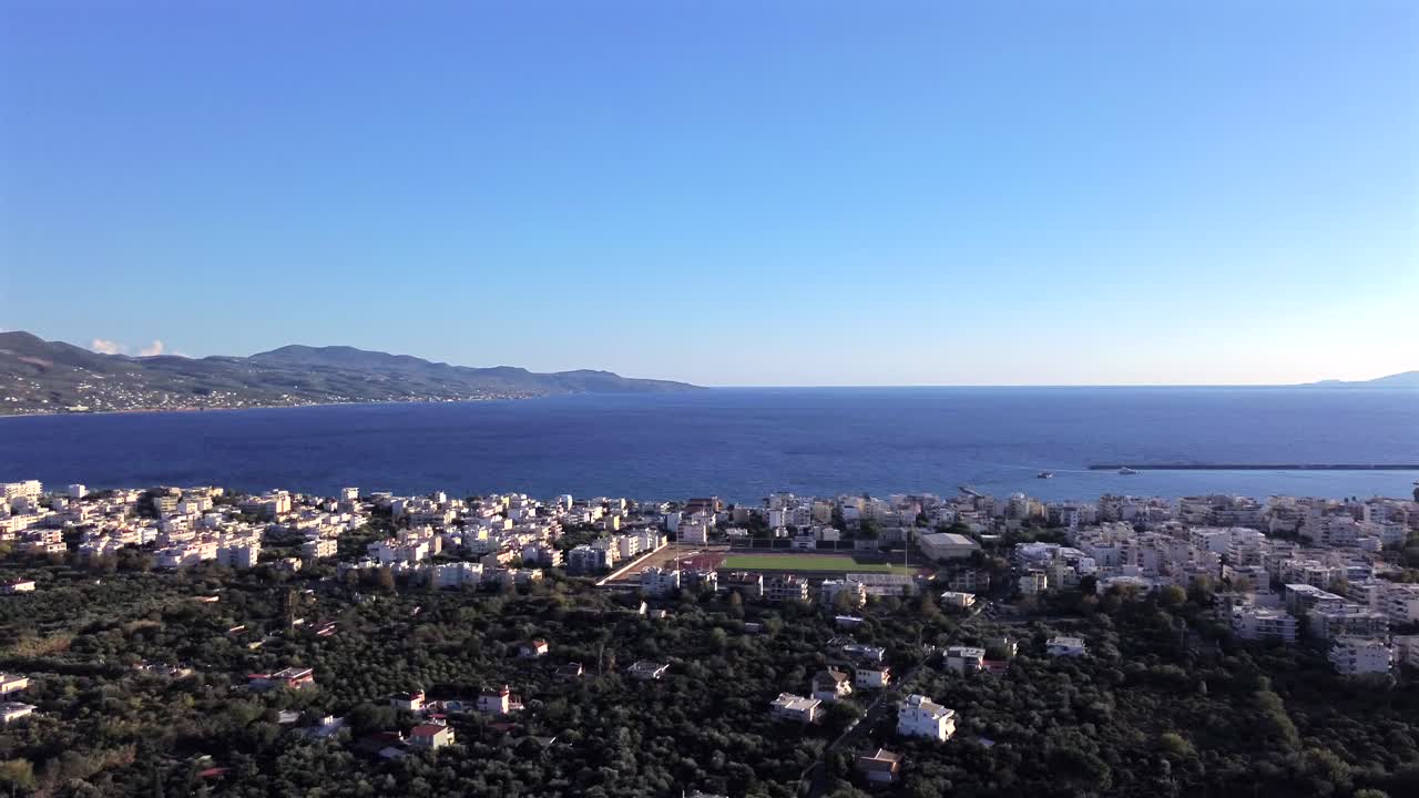 Aerial view of Messinian gulf, as seen from city of Kalamata on an autumn clear sky day, left pan 4k