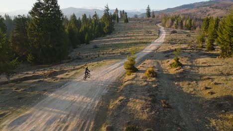 mountain biking on a dirt road
