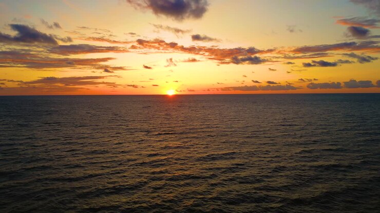 Aerial view of sunset horizon over the sea