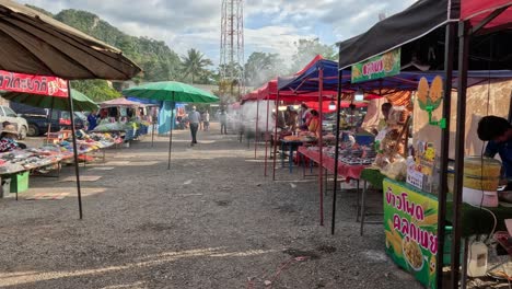 shoppers and vendors at a vibrant outdoor market.