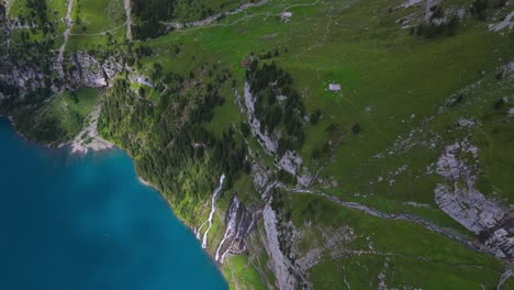 cinematic flight in the alps at the mountain lake