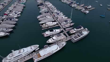 Aerial-view-of-luxury-yachts-and-sailboats-in-marina