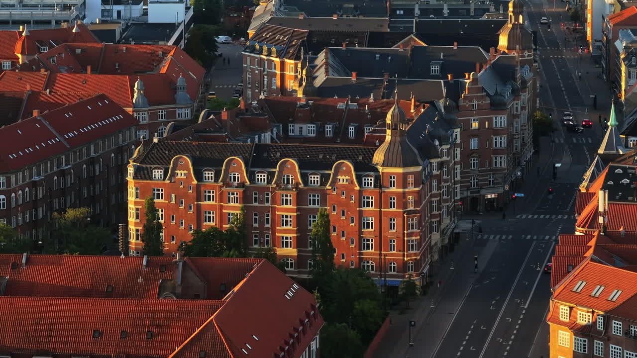 Aerial drone view of Amagerbro area in the northern part of the island Amager in Copenhagen, Denmark at sunset