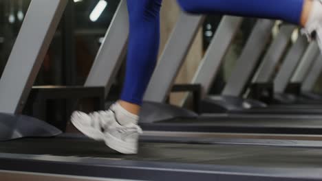 woman running on treadmill