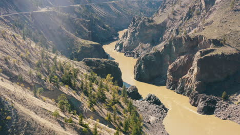 aerial slide out over dramatic river gorge landscape