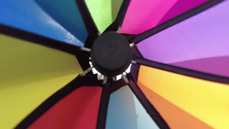 slowly move toward colorful pinwheel spin