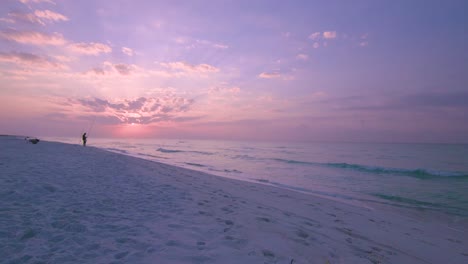 timelapse sunrise fully clouds in the sky on the sand beach emeralds waters of the gulf coast, florida