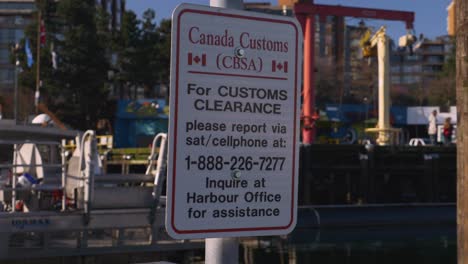 canada customs cbsa sign marina boat launch harbor for clearance please report via cellphone