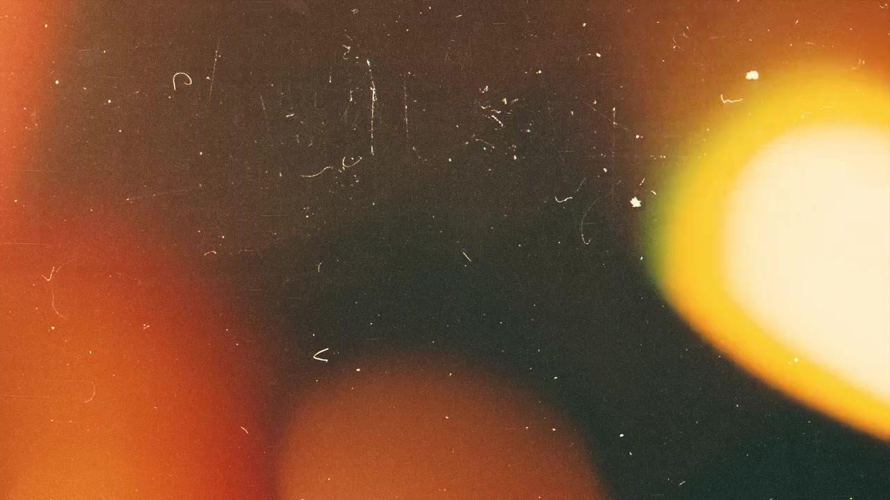 Perdite di luce astratte e sovrapposizione di texture a grana di pellicola.