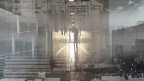 animation of cityscape over caucasian walking in corridor