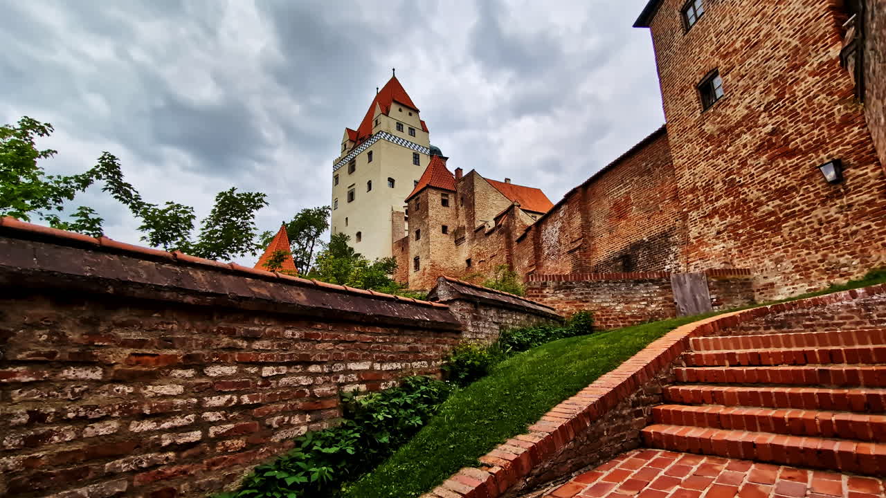 Trausnitz Castle tower with brick walls and steps in Landshut, Germany