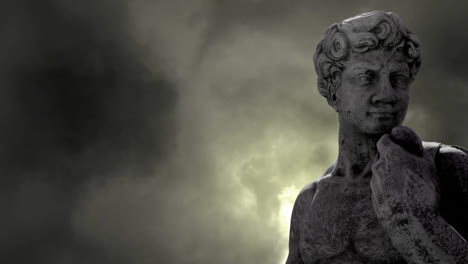 animation of gray sculpture of man over dark sky and storm clouds, copy space