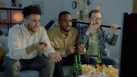 friends watching a hockey game