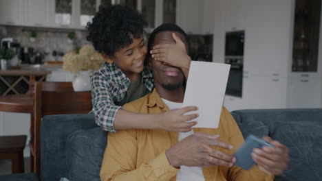 father and son sharing a moment of joy