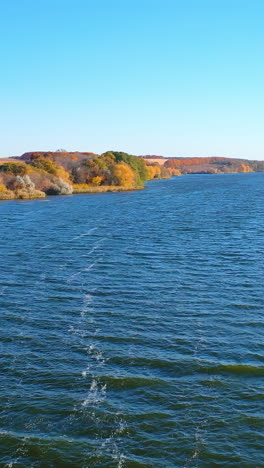 beautiful natural outdoor travel sceneries. river landscapes autumn scenery. vertical video