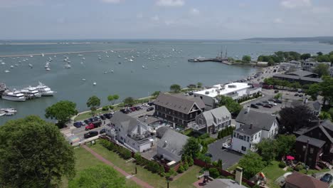 Aerial-view-over-buildings-on-the-coast-of-sunny-Plymouth,-Massachusetts,-USA