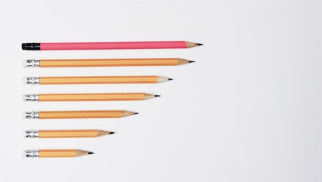 Close-up-of-pencils-with-erasers-with-copy-space-on-white-background