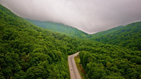 Smoky Mountains captured in soft morning fog by drone