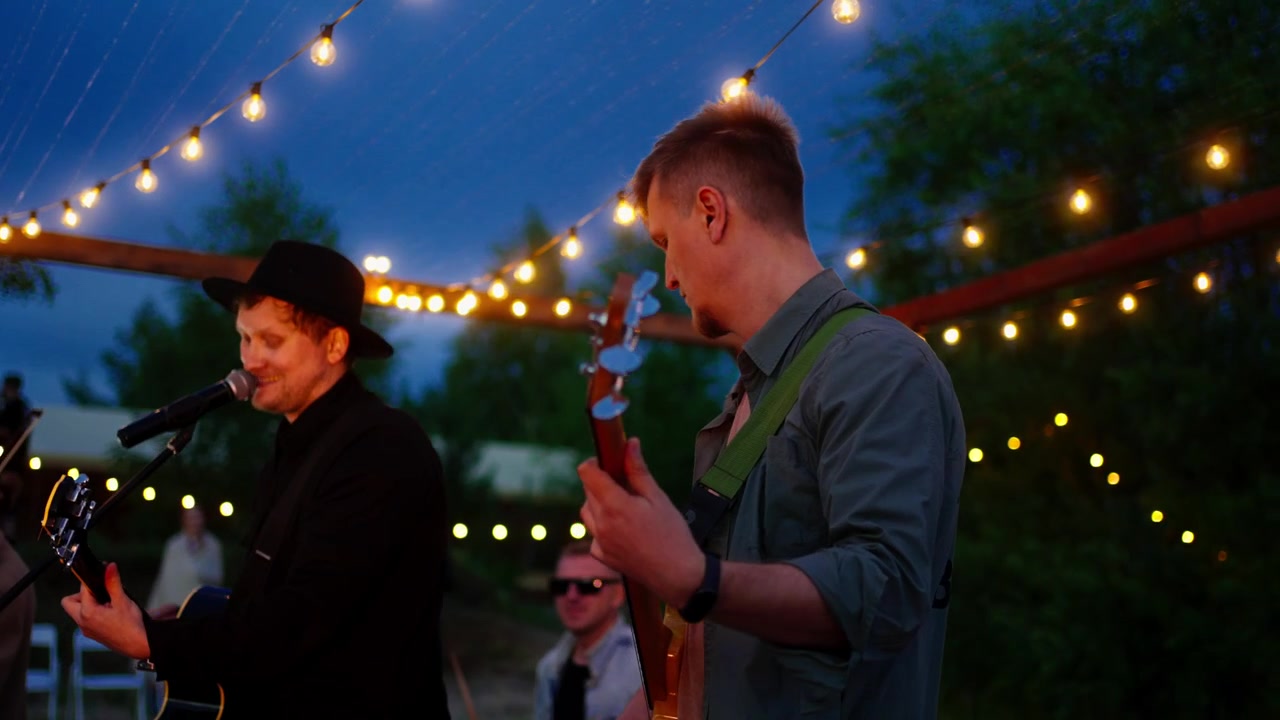 Live Band Performing Music at an Outdoor Evening Event