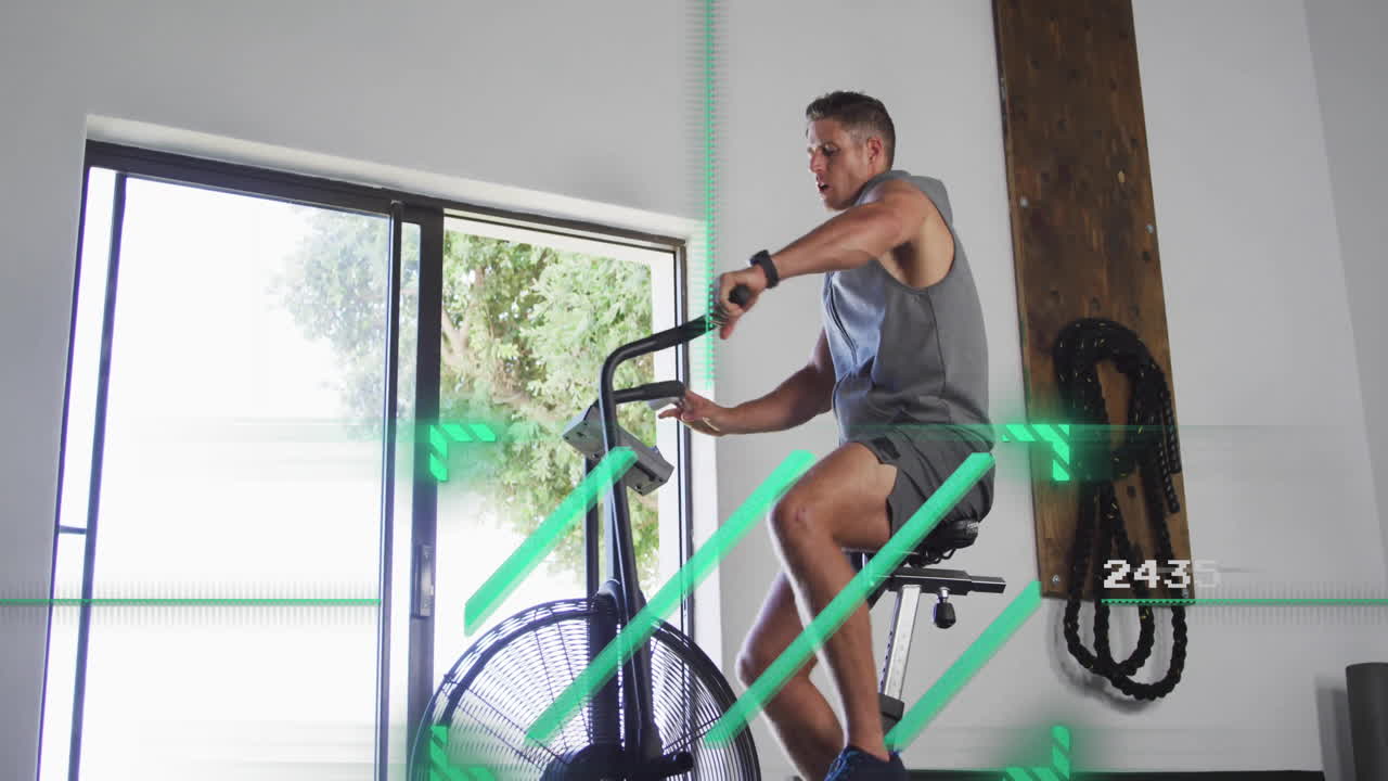 Exercising on stationary bike, man with animation overlay in bright room