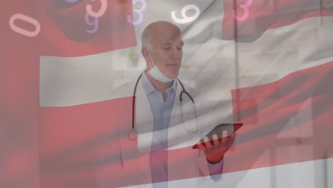 Animation-of-numbers-and-switzerland-flag-over-caucasian-male-doctor-in-face-mask-using-tablet