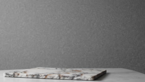 marble tray display against a gray background