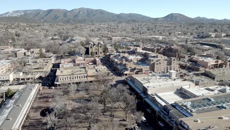 downtown santa fe, new mexico with drone video wide shot moving in a circle move