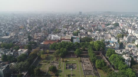 aerial view of a historic fort in a dense indian city