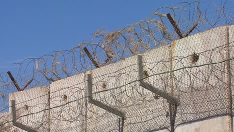 barbed wire adorns the top of the new west bank barrier between israel and the palestinian territories 1