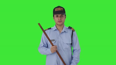 angry indian security guard looking at the camera green screen