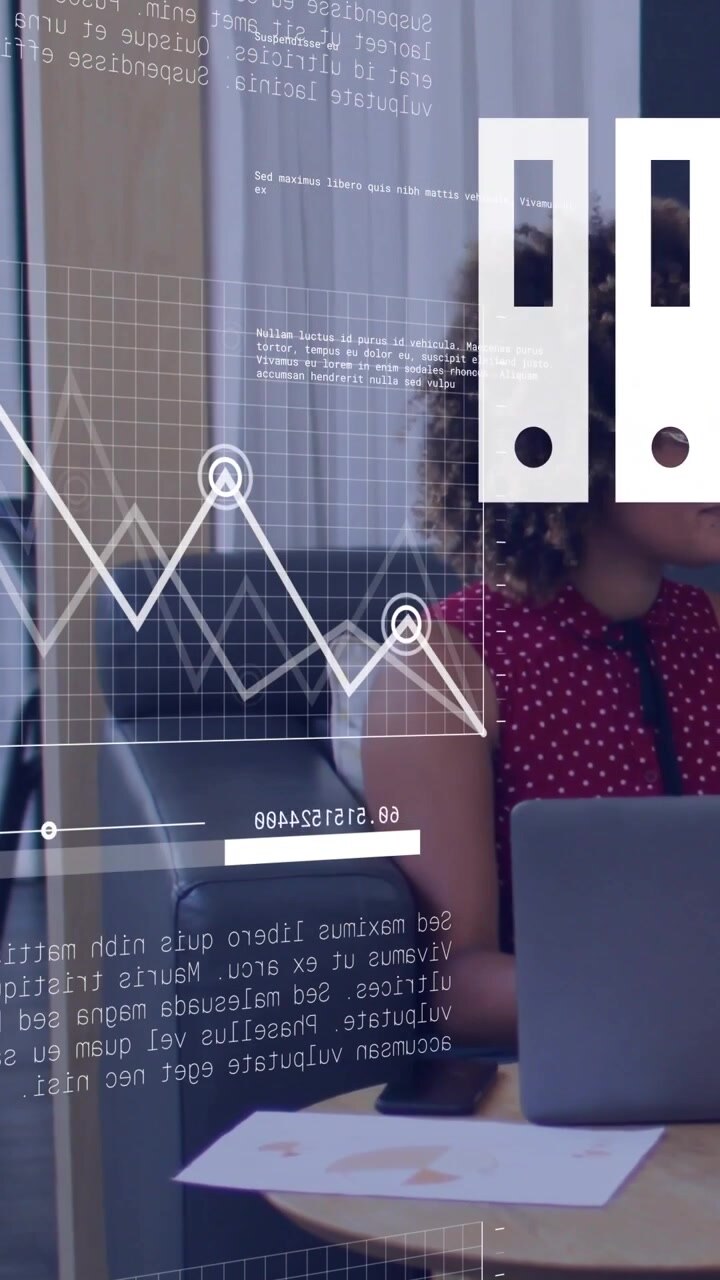 Woman at table observing laptop while system launching animated business charts sliding toward her