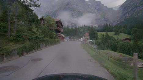 driving from interlaken to grindelwald in the swiss alps in pouring rain