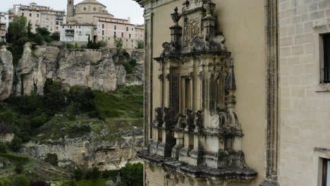 gothic exterior of former dominican convent now luxury hotel atop huecar gorge in cuenca, spain